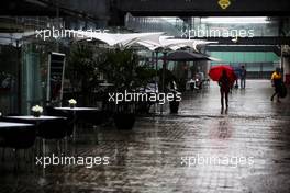 Rain falls in the paddock. 09.11.2017. Formula 1 World Championship, Rd 19, Brazilian Grand Prix, Sao Paulo, Brazil, Preparation Day.