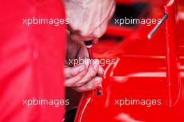 Ferrari SF70H worked on by a mechanic. 09.06.2017. Formula 1 World Championship, Rd 7, Canadian Grand Prix, Montreal, Canada, Practice Day.