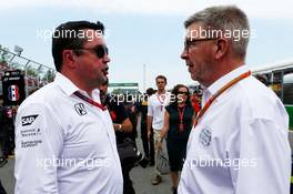 (L to R): Eric Boullier (FRA) McLaren Racing Director with Ross Brawn (GBR) Managing Director, Motor Sports on the grid. 11.06.2017. Formula 1 World Championship, Rd 7, Canadian Grand Prix, Montreal, Canada, Race Day.