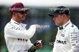(L to R): Lewis Hamilton (GBR) Mercedes AMG F1 with team mate Valtteri Bottas (FIN) Mercedes AMG F1. 10.06.2017. Formula 1 World Championship, Rd 7, Canadian Grand Prix, Montreal, Canada, Qualifying Day.