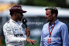 (L to R): Lewis Hamilton (GBR) Mercedes AMG F1 with Will Buxton (GBR) NBC Sports Network TV Presenter. 10.06.2017. Formula 1 World Championship, Rd 7, Canadian Grand Prix, Montreal, Canada, Qualifying Day.