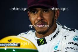 Lewis Hamilton (GBR) Mercedes AMG F1 in the FIA Press Conference with the helmet of Ayrton Senna, presented to him after equalling the number of pole positions set by the Brazilian. 10.06.2017. Formula 1 World Championship, Rd 7, Canadian Grand Prix, Montreal, Canada, Qualifying Day.