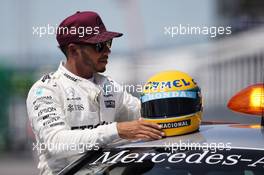 Lewis Hamilton (GBR) Mercedes AMG F1 with the helmet of Ayrton Senna, presented to him after equalling the number of pole positions set by the Brazilian.l 10.06.2017. Formula 1 World Championship, Rd 7, Canadian Grand Prix, Montreal, Canada, Qualifying Day.