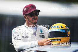 Lewis Hamilton (GBR) Mercedes AMG F1 with the helmet of Ayrton Senna, presented to him after equalling the number of pole positions set by the Brazilian. 10.06.2017. Formula 1 World Championship, Rd 7, Canadian Grand Prix, Montreal, Canada, Qualifying Day.
