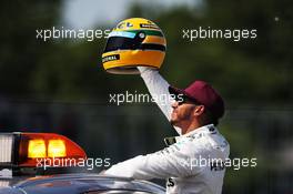 Lewis Hamilton (GBR) Mercedes AMG F1 with the helmet of Ayrton Senna, presented to him after equalling the number of pole positions set by the Brazilian.l 10.06.2017. Formula 1 World Championship, Rd 7, Canadian Grand Prix, Montreal, Canada, Qualifying Day.