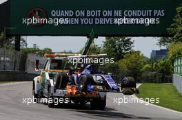 The Sauber C36 of Pascal Wehrlein (GER) Sauber F1 Team is recovered back to the pits on the back of a truck after he crashed during qualifying. 10.06.2017. Formula 1 World Championship, Rd 7, Canadian Grand Prix, Montreal, Canada, Qualifying Day.