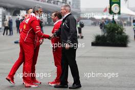 Ross Brawn (GBR) Managing Director, Motor Sports with Maurizio Arrivabene (ITA) Ferrari Team Principal. 07.04.2017. Formula 1 World Championship, Rd 2, Chinese Grand Prix, Shanghai, China, Practice Day.
