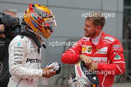 Lewis Hamilton (GBR) Mercedes AMG F1  and Sebastian Vettel (GER) Scuderia Ferrari  09.04.2017. Formula 1 World Championship, Rd 2, Chinese Grand Prix, Shanghai, China, Race Day.