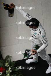 Race winner Lewis Hamilton (GBR) Mercedes AMG F1 celebrates on the podium. 09.04.2017. Formula 1 World Championship, Rd 2, Chinese Grand Prix, Shanghai, China, Race Day.