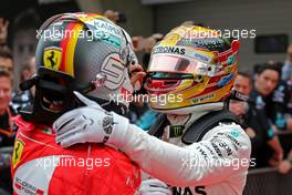 Sebastian Vettel (GER) Scuderia Ferrari and Lewis Hamilton (GBR) Mercedes AMG F1   09.04.2017. Formula 1 World Championship, Rd 2, Chinese Grand Prix, Shanghai, China, Race Day.