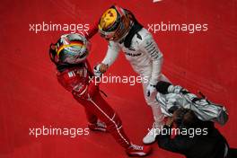 Race winner Lewis Hamilton (GBR) Mercedes AMG F1 celebrates in parc ferme with second placed Sebastian Vettel (GER) Ferrari. 09.04.2017. Formula 1 World Championship, Rd 2, Chinese Grand Prix, Shanghai, China, Race Day.