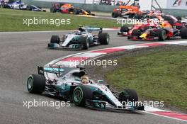 Lewis Hamilton (GBR) Mercedes AMG F1 W08 leads at the start of the race. 09.04.2017. Formula 1 World Championship, Rd 2, Chinese Grand Prix, Shanghai, China, Race Day.