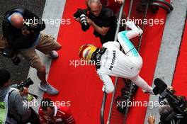 Lewis Hamilton (GBR) Mercedes AMG F1 celebrates his pole position in parc ferme. 08.04.2017. Formula 1 World Championship, Rd 2, Chinese Grand Prix, Shanghai, China, Qualifying Day.