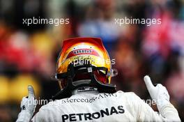 Lewis Hamilton (GBR) Mercedes AMG F1 celebrates his pole position in parc ferme. 08.04.2017. Formula 1 World Championship, Rd 2, Chinese Grand Prix, Shanghai, China, Qualifying Day.