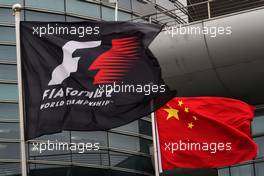 F1 and Chinese flags in the paddock. 06.04.2017. Formula 1 World Championship, Rd 2, Chinese Grand Prix, Shanghai, China, Preparation Day.