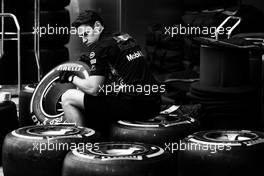 A Red Bull Racing mechanic with Pirelli tyres. 06.04.2017. Formula 1 World Championship, Rd 2, Chinese Grand Prix, Shanghai, China, Preparation Day.