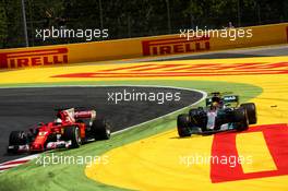 Sebastian Vettel (GER) Ferrari SF70H and Lewis Hamilton (GBR) Mercedes AMG F1 W08 battle for the lead of the race. 14.05.2017. Formula 1 World Championship, Rd 5, Spanish Grand Prix, Barcelona, Spain, Race Day.