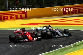 Sebastian Vettel (GER) Ferrari SF70H and Lewis Hamilton (GBR) Mercedes AMG F1 W08 battle for the lead of the race. 14.05.2017. Formula 1 World Championship, Rd 5, Spanish Grand Prix, Barcelona, Spain, Race Day.