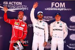 Qualifying top three in parc ferme (L to R): Sebastian Vettel (GER) Ferrari, second; Lewis Hamilton (GBR) Mercedes AMG F1, pole position; Valtteri Bottas (FIN) Mercedes AMG F1, third. 13.05.2017. Formula 1 World Championship, Rd 5, Spanish Grand Prix, Barcelona, Spain, Qualifying Day.