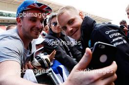 Valtteri Bottas (FIN) Mercedes AMG F1 with fans. 11.05.2017. Formula 1 World Championship, Rd 5, Spanish Grand Prix, Barcelona, Spain, Preparation Day.