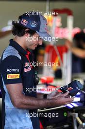 Carlos Sainz Jr (ESP) Scuderia Toro Rosso with a lightweight Alpinestars racing boot. 11.05.2017. Formula 1 World Championship, Rd 5, Spanish Grand Prix, Barcelona, Spain, Preparation Day.