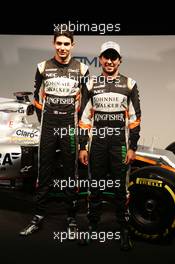 (L to R): Esteban Ocon (FRA) Sahara Force India F1 Team with team mate Sergio Perez (MEX) Sahara Force India F1 and the Sahara Force India F1 VJM10. 22.02.2017. Sahara Force India F1 VJM10 Launch, Silverstone, England.