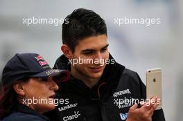 Esteban Ocon (FRA) Sahara Force India F1 Team with a fan. 14.07.2017. Formula 1 World Championship, Rd 10, British Grand Prix, Silverstone, England, Practice Day.