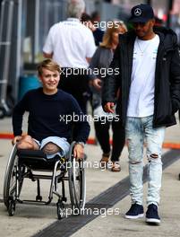 Lewis Hamilton (GBR) Mercedes AMG F1 with Billy Monger (GBR) Racing Driver. 14.07.2017. Formula 1 World Championship, Rd 10, British Grand Prix, Silverstone, England, Practice Day.