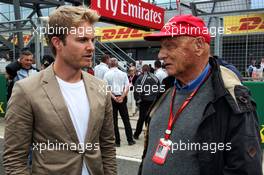 (L to R): Nico Rosberg (GER) with Niki Lauda (AUT) Mercedes Non-Executive Chairman on the grid. 16.07.2017. Formula 1 World Championship, Rd 10, British Grand Prix, Silverstone, England, Race Day.