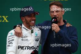 Lewis Hamilton (GBR) Mercedes AMG F1 W08 and Jenson Button (GBR). 16.07.2017. Formula 1 World Championship, Rd 10, British Grand Prix, Silverstone, England, Race Day.