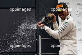 Race winner Lewis Hamilton (GBR) Mercedes AMG F1 celebrates on the podium. 16.07.2017. Formula 1 World Championship, Rd 10, British Grand Prix, Silverstone, England, Race Day.