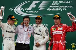 The podium (L to R): Valtteri Bottas (FIN) Mercedes AMG F1, second; Peter Bonnington (GBR) Mercedes AMG F1 Race Engineer; Lewis Hamilton (GBR) Mercedes AMG F1, race winner; Kimi Raikkonen (FIN) Ferrari, third. 16.07.2017. Formula 1 World Championship, Rd 10, British Grand Prix, Silverstone, England, Race Day.