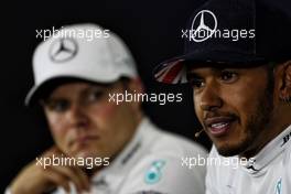 Lewis Hamilton (GBR) Mercedes AMG F1 and Valtteri Bottas (FIN) Mercedes AMG F1 in the FIA Press Conference. 16.07.2017. Formula 1 World Championship, Rd 10, British Grand Prix, Silverstone, England, Race Day.