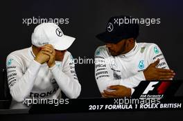 (L to R): Valtteri Bottas (FIN) Mercedes AMG F1 and Lewis Hamilton (GBR) Mercedes AMG F1 in the FIA Press Conference. 16.07.2017. Formula 1 World Championship, Rd 10, British Grand Prix, Silverstone, England, Race Day.