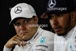 Valtteri Bottas (FIN) Mercedes AMG F1 and Lewis Hamilton (GBR) Mercedes AMG F1 in the FIA Press Conference. 16.07.2017. Formula 1 World Championship, Rd 10, British Grand Prix, Silverstone, England, Race Day.