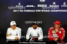 The post race FIA Press Conference (L to R): Valtteri Bottas (FIN) Mercedes AMG F1, second; Lewis Hamilton (GBR) Mercedes AMG F1, race winner; Kimi Raikkonen (FIN) Ferrari, third. 16.07.2017. Formula 1 World Championship, Rd 10, British Grand Prix, Silverstone, England, Race Day.