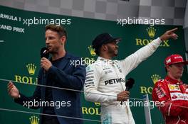 (L to R): Jenson Button (GBR) McLaren and race winner Lewis Hamilton (GBR) Mercedes AMG F1 on the podium. 16.07.2017. Formula 1 World Championship, Rd 10, British Grand Prix, Silverstone, England, Race Day.