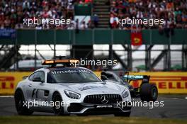 Lewis Hamilton (GBR) Mercedes AMG F1 W08 leads behind the FIA Safety Car. 16.07.2017. Formula 1 World Championship, Rd 10, British Grand Prix, Silverstone, England, Race Day.