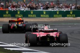Max Verstappen (NLD) Red Bull Racing RB13 leads Sebastian Vettel (GER) Ferrari SF70H. 16.07.2017. Formula 1 World Championship, Rd 10, British Grand Prix, Silverstone, England, Race Day.