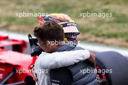 Lewis Hamilton (GBR) Mercedes AMG F1 celebrates his pole position with Jenson Button (GBR) McLaren. 15.07.2017. Formula 1 World Championship, Rd 10, British Grand Prix, Silverstone, England, Qualifying Day.