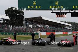 Lewis Hamilton (GBR) Mercedes AMG F1 W08 celebrates his pole position with Sebastian Vettel (GER) Ferrari SF70H (Left) and Kimi Raikkonen (FIN) Ferrari SF70H (Right). 15.07.2017. Formula 1 World Championship, Rd 10, British Grand Prix, Silverstone, England, Qualifying Day.