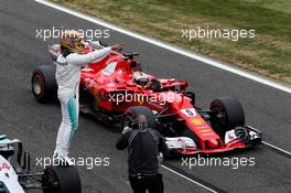 Lewis Hamilton (GBR) Mercedes AMG F1 W08 celebrates his pole position in front of Sebastian Vettel (GER) Ferrari SF70H. 15.07.2017. Formula 1 World Championship, Rd 10, British Grand Prix, Silverstone, England, Qualifying Day.