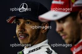 Lewis Hamilton (GBR) Mercedes AMG F1 and Sebastian Vettel (GER) Ferrari in the post qualifying FIA Press Conference. 15.07.2017. Formula 1 World Championship, Rd 10, British Grand Prix, Silverstone, England, Qualifying Day.