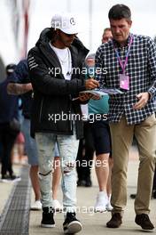 Lewis Hamilton (GBR) Mercedes AMG F1 signs autographs for the fans. 16.07.2017. Formula 1 World Championship, Rd 10, British Grand Prix, Silverstone, England, Race Day.