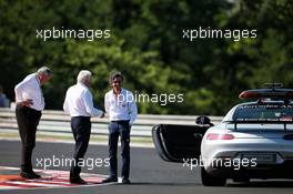 Charlie Whiting (GBR) FIA Delegate with Laurent Mekies (FRA) FIA Safety Director. 28.07.2017. Formula 1 World Championship, Rd 11, Hungarian Grand Prix, Budapest, Hungary, Practice Day.