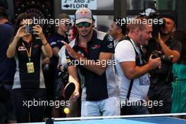 Carlos Sainz Jr (ESP) Scuderia Toro Rosso plays table tennis. 30.07.2017. Formula 1 World Championship, Rd 11, Hungarian Grand Prix, Budapest, Hungary, Race Day.