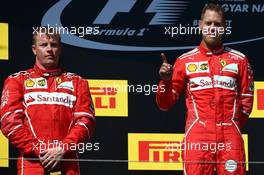 1st place Sebastian Vettel (GER) Ferrari SF70H, 2nd place Kimi Raikkonen (FIN) Ferrari SF70H and 3rd place. 30.07.2017. Formula 1 World Championship, Rd 11, Hungarian Grand Prix, Budapest, Hungary, Race Day.
