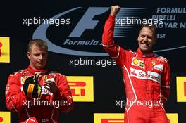 1st place Sebastian Vettel (GER) Ferrari SF70H, 2nd place Kimi Raikkonen (FIN) Ferrari SF70H and 3rd place. 30.07.2017. Formula 1 World Championship, Rd 11, Hungarian Grand Prix, Budapest, Hungary, Race Day.