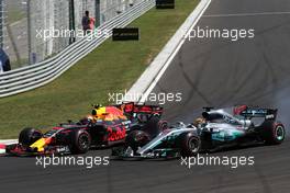 Max Verstappen (NLD) Red Bull Racing and Lewis Hamilton (GBR) Mercedes AMG F1   30.07.2017. Formula 1 World Championship, Rd 11, Hungarian Grand Prix, Budapest, Hungary, Race Day.