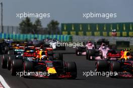 (L to R): Daniel Ricciardo (AUS) Red Bull Racing RB13 and Max Verstappen (NLD) Red Bull Racing RB13 at the start of the race. 30.07.2017. Formula 1 World Championship, Rd 11, Hungarian Grand Prix, Budapest, Hungary, Race Day.